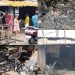 A house with a shop gutted in a devastating fire late at night