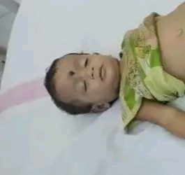 The mother committed suicide by putting poison in the mouth of a one and a half year old child!