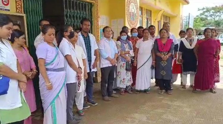 Doctors and health workers sat on demonstration