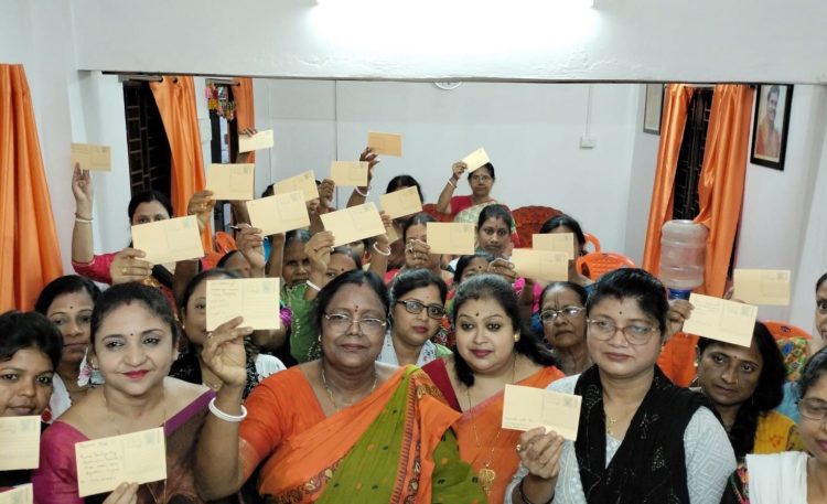 9Post card distribution program was held by 9th Banmalipur Mahila Morcha