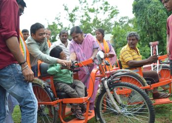 Provision of free motorized tri-cycles to 94 Divyangs