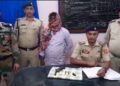 Man arrested with with a loaded firearm and two rounds of ammunition