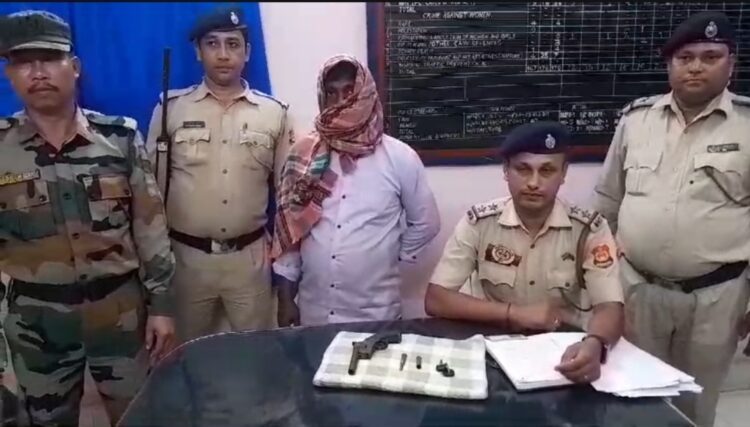 Man arrested with with a loaded firearm and two rounds of ammunition