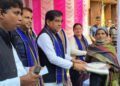 Cloth distribution program holds on completion of three years of BJP-led municipal corporation governance