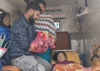 Woman delivers a baby  in Ambulance