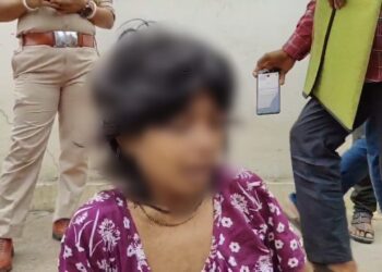 Woman Protests for Justice Amid Financial Struggles