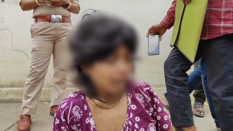 Woman Protests for Justice Amid Financial Struggles
