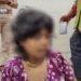 Woman Protests for Justice Amid Financial Struggles