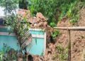Family safe as tower wall crashes onto house during rain
