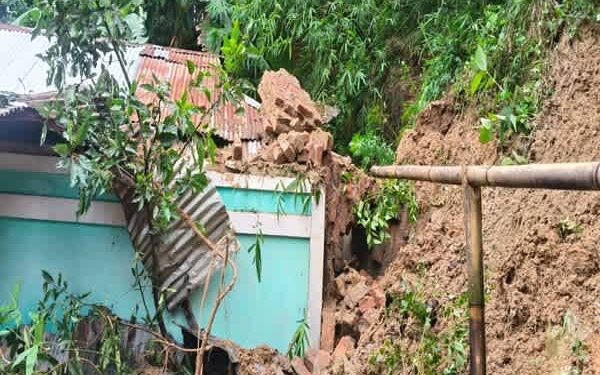 Family safe as tower wall crashes onto house during rain