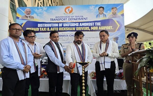 Tripura minister distributes uniforms to taxi, auto drivers to boost tourism
